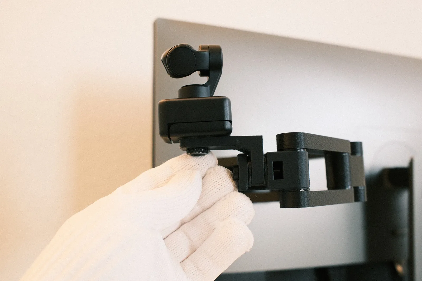Webcam attached to the arm via standard 1/4 inch mount